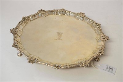 Lot 596 - A George III Silver Waiter, Ebenezer Coker, London 1769, shaped circular raised on three paw scroll