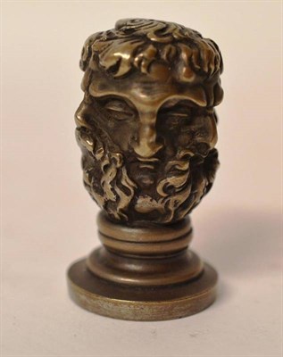 Lot 603 - A Victorian Silvered Metal Desk Seal, circa 1850, the handle modelled as conjoined classical busts