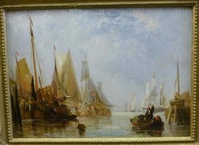 Lot 787 - Circle of Alfred Montague (19th century) Fishing boats and other vessels anchored in a harbour...