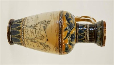 Lot 954 - A Doulton Lambeth Stoneware Jug, by Hannah Barlow, scraffito decorated with a continuous frieze...