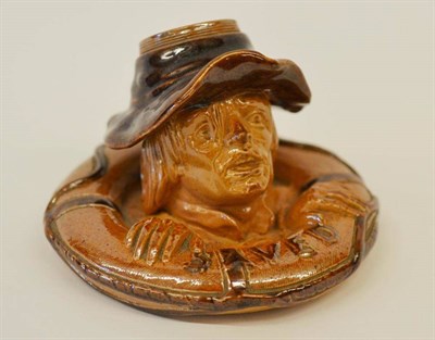 Lot 970 - A Doulton Lambeth Salt-Glazed  "Saved " Figural Match Holder, circa 1894, modelled as a...