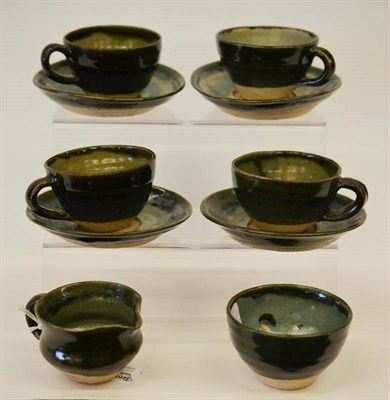 Lot 994 - Katharine Pleydell-Bouverie (1895-1985): A Stoneware Teaset, olive green glaze exterior, pale...