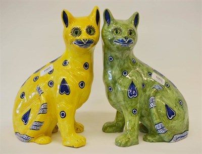 Lot 1003 - Two Early 20th Century Mosanic Cats, each in a seated pose, with glass eyes, painted with heart and