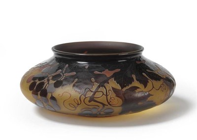 Lot 1006 - A D'Argental Cameo Glass Bowl, the amber ground cut with a flowering vine in dark red, signed...