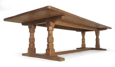 Lot 1043 - A Robert  "Mouseman " Thompson Oak 10' Five Plank Refectory Table, on four octagonal turned...