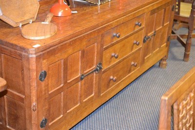 Lot 1045 - A Robert  "Mouseman " Thompson Oak 6' Sideboard, with raised upstand, the top over three long...