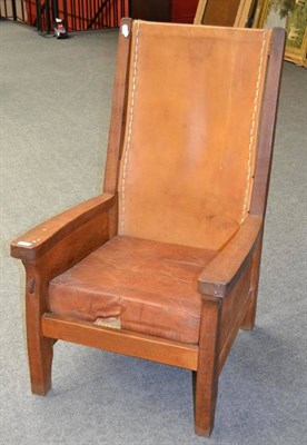 Lot 1047 - A Robert  "Mouseman " Thompson Oak Smoker's Chair, with slung leather back, cow hide covered...