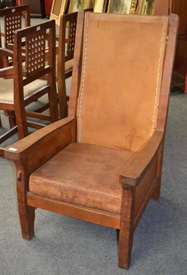 Lot 1048 - A Robert  "Mouseman " Thompson Oak Smoker's Chair, with slung leather back, cow hide covered...