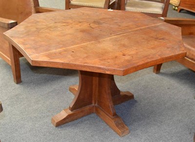 Lot 1050 - A Robert  "Mouseman " Thompson Oak Three Plank Octagonal Smoking Table, on a cruciform base,...