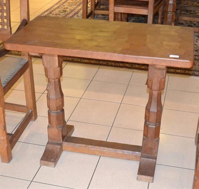 Lot 1055 - A Robert  "Mouseman " Thompson Oak Extension Table, on two octagonal legs joined by a stretcher...