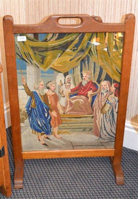 Lot 1058 - A Robert  "Mouseman " Thompson Oak Fire-Screen, inset with a woolwork picture, with carrying...