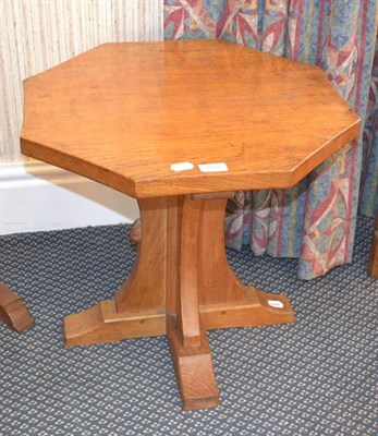 Lot 1071 - A Robert  "Mouseman " Thompson Oak Octagonal Coffee Table, on a cruciform base, with carved...