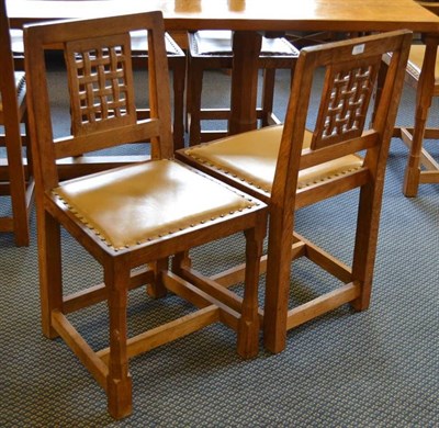 Lot 1076 - A Set of Eight Peter  "Rabbitman " Heap Oak Lattice Back Dining Chairs, on turned octagonal...