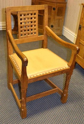 Lot 1077 - A Pair of Peter  "Rabbitman " Heap Oak Lattice Back Arm Chairs, on turned octagonal front legs...