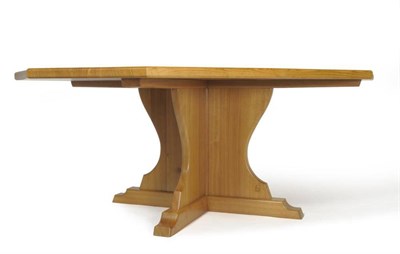 Lot 1080 - An Old Mill Furniture Octagonal Oak Refectory Table, on a cruciform base, with recessed carved...