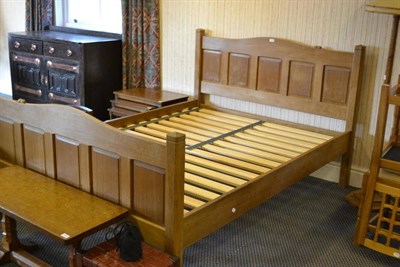 Lot 1085 - A Colin  "Beaverman " Almack Oak 5' Panelled Bedstead, the headboard with shaped top rail and...