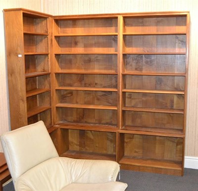 Lot 1087 - An Alan Grainger Acorn Industries Oak Four Section Corner Bookcase, with fixed and adjustable...