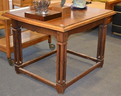 Lot 1105 - An Arts & Crafts Oak Centre Table, the top with moulded edges above an apron frieze, on four...