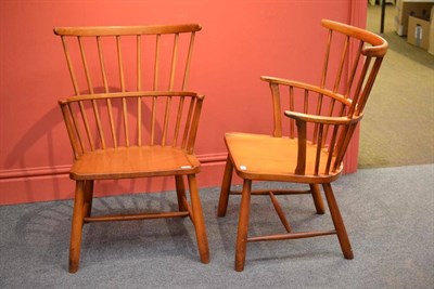 Lot 1113 - A Pair of Danish Fritz Henningsen Beech Windsor Chairs, with double spindle backs, on shaped seats