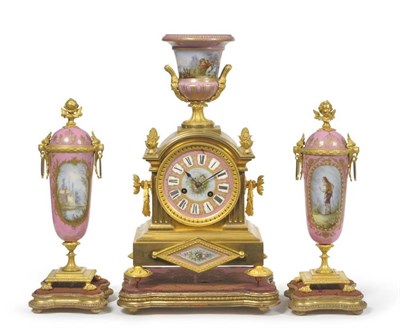 Lot 1150 - A French Ormolu and Pink Porcelain Striking Mantel Clock Garniture, stamped Achille Brocot,...