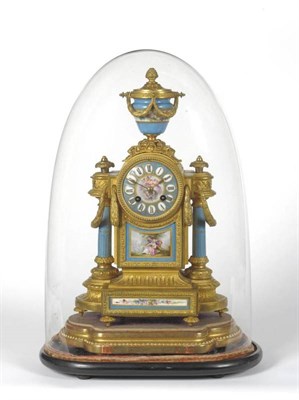 Lot 1157 - A French Gilt Metal and Porcelain Mounted Striking Mantel Clock, circa 1890, with urn finial,...