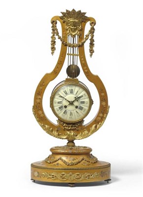 Lot 1162 - A Gilt Wooden Painted Striking Lyre Clock, circa 1890, with applied gilt metal floral and mask...