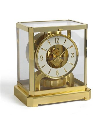 Lot 1167 - A Gilt Brass Atmos Clock, signed LeCoultre, No.303252, circa 1980, with glazed panels, inside...