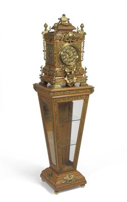 Lot 1184 - An Impressive Oak Chiming Pedestal Clock, circa 1890, elaborately decorated with gilt metal...