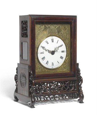 Lot 1185 - A Chinese Striking Table Clock, 19th century, rectangular form with pierced side and front...