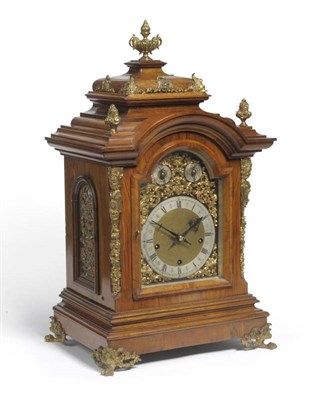 Lot 1186 - A Walnut Chiming Table Clock, circa 1890, arched top and urn finial, pierced side sound fret doors