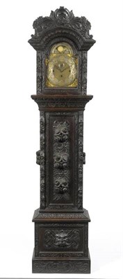 Lot 1209 - A Carved Chiming Longcase Clock, circa 1890, elaborate case carved throughout with scroll and...