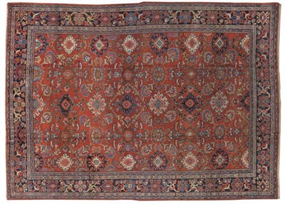 Lot 1242 - Good Mahal Carpet Sultanabad, West Persia The brick red field with columns of large stylised...