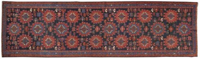 Lot 1255 - Good Hamadan Runner Persian Kurdistan The deep indigo field with three columns of large...