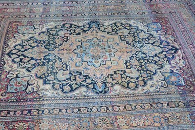 Lot 1283 - Mashad Carpet Khorasan, East Persia The indigo field of leafy flowering vines around a pole...