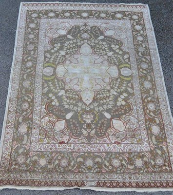 Lot 1293 - Silk and Metal Thread Hereke Rug  North West Anatolia The silver ground with tulips and...