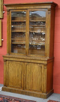 Lot 1306 - A Victorian Mahogany Bookcase, 3rd quarter 19th century, the cavetto cornice above carved...