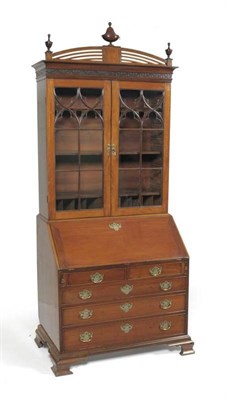 Lot 1309 - A George III Mahogany Bureau Bookcase, late 18th century, the domed pediment surmounted by...