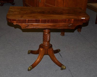 Lot 1315 - A George IV Mahogany Foldover Card Table, 2nd quarter 19th century, of rounded rectangular form...