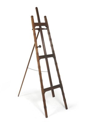 Lot 1319 - A Late Victorian Walnut Easel, by Howard & Sons, Berners Street, London, late 19th century, of...