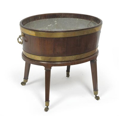 Lot 1320 - A George III Mahogany and Brass Bound Oval Wine Cooler, late 18th century, of staved...