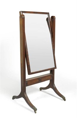 Lot 1321 - A Late George III Mahogany Adjustable Cheval Mirror, early 19th century, the rectangular plate...