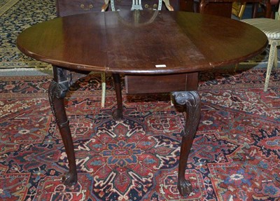 Lot 1325 - A George II Mahogany Gateleg Dining Table, mid 18th century, with two rounded drop leaves,...