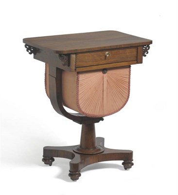 Lot 1330 - A Victorian Rosewood Sewing Table, mid 19th century, the single frieze drawer flanked by fret...