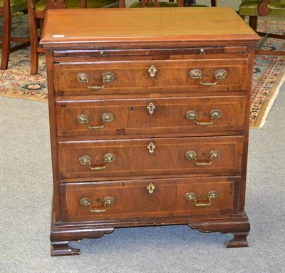 Lot 1332 - A George II Style Walnut and Feather Banded Straight Front Chest, the moulded top above a...