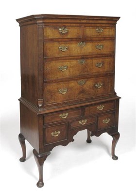 Lot 1338 - An 18th Century Walnut Straight Front Chest of Drawers, the cavetto cornice above two short and...