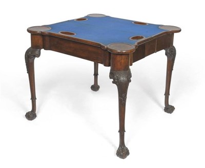 Lot 1340 - A George II Walnut  Foldover Games Table, mid 18th century, with eared corners, the hinged top...