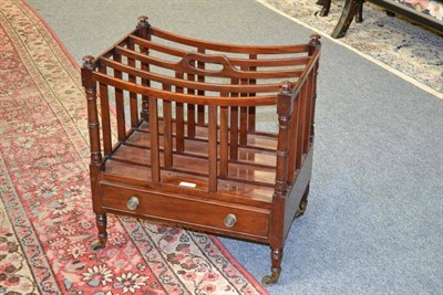 Lot 1345 - A Late George III Mahogany Canterbury, early 19th century, with four concave shaped dividers...