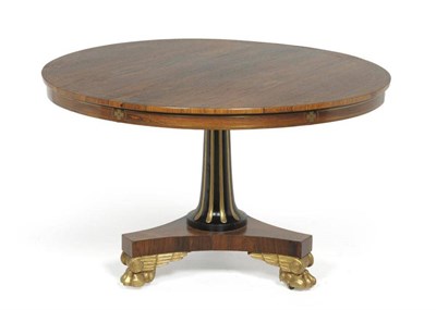 Lot 1355 - A Regency Rosewood and Brass Inlaid Pedestal Table, early 19th century, raised on a parcel gilt...