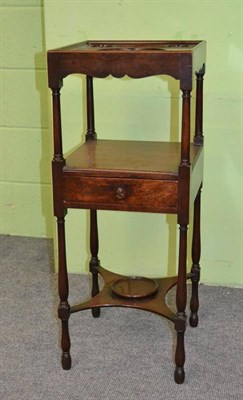 Lot 1364 - A George III Mahogany Two-Tier Washstand, of rectangular shaped form with a wavy shaped apron,...