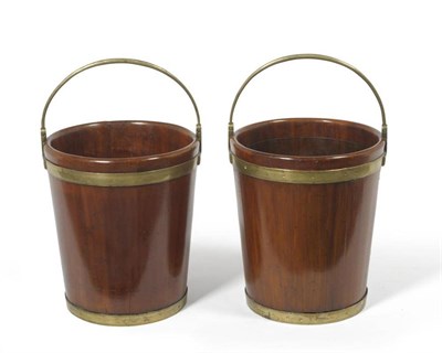 Lot 1368 - A Near Pair of George III Mahogany and Brass Bound Peat Buckets, early 19th century, of...